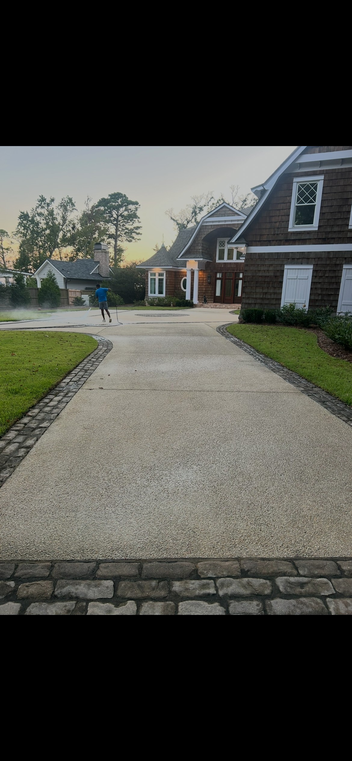 Before exterior cleaning of a dirty driveway in Gulf Breeze