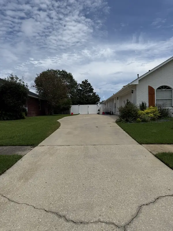 Residential concrete driveway after pressure washing