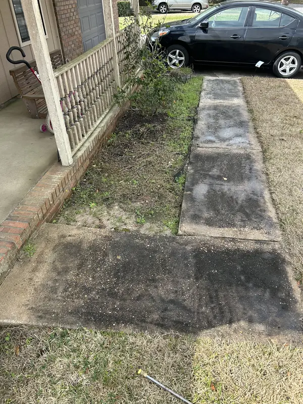 Before walkway cleaning with surface buildup in Pensacola