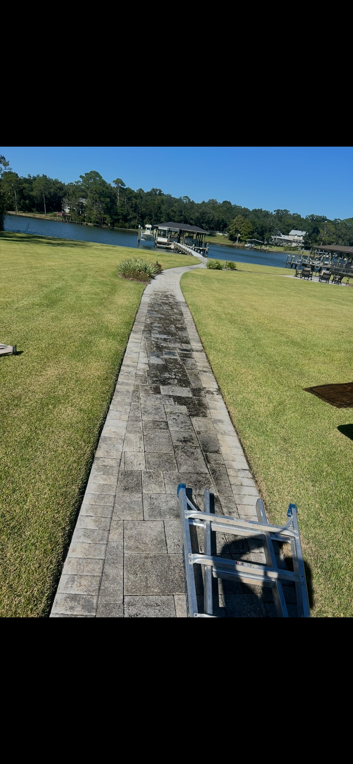 Before pressure washing on dirty outdoor pavers in Pensacola