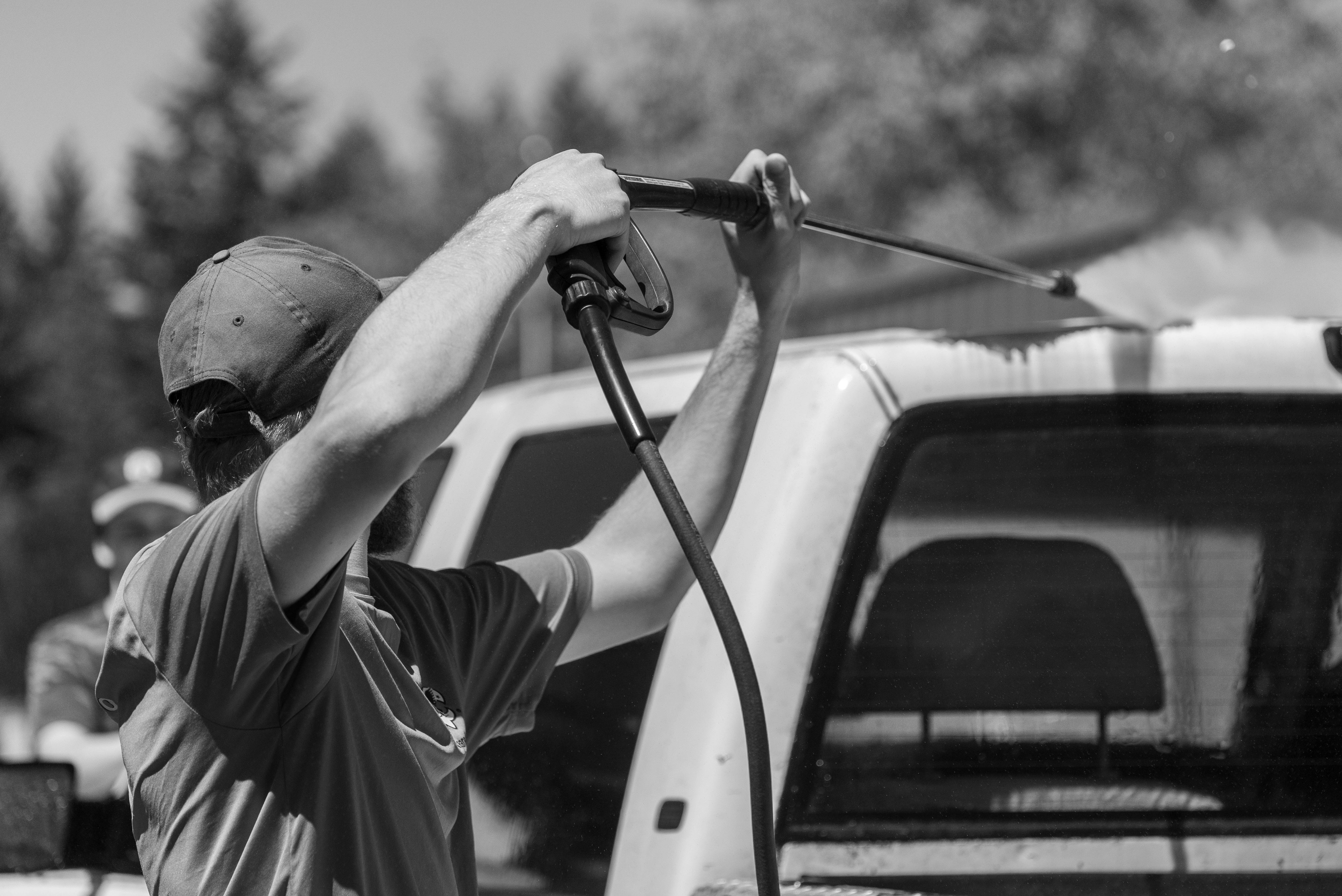 Exterior cleaning technician pressure washing in Pensacola