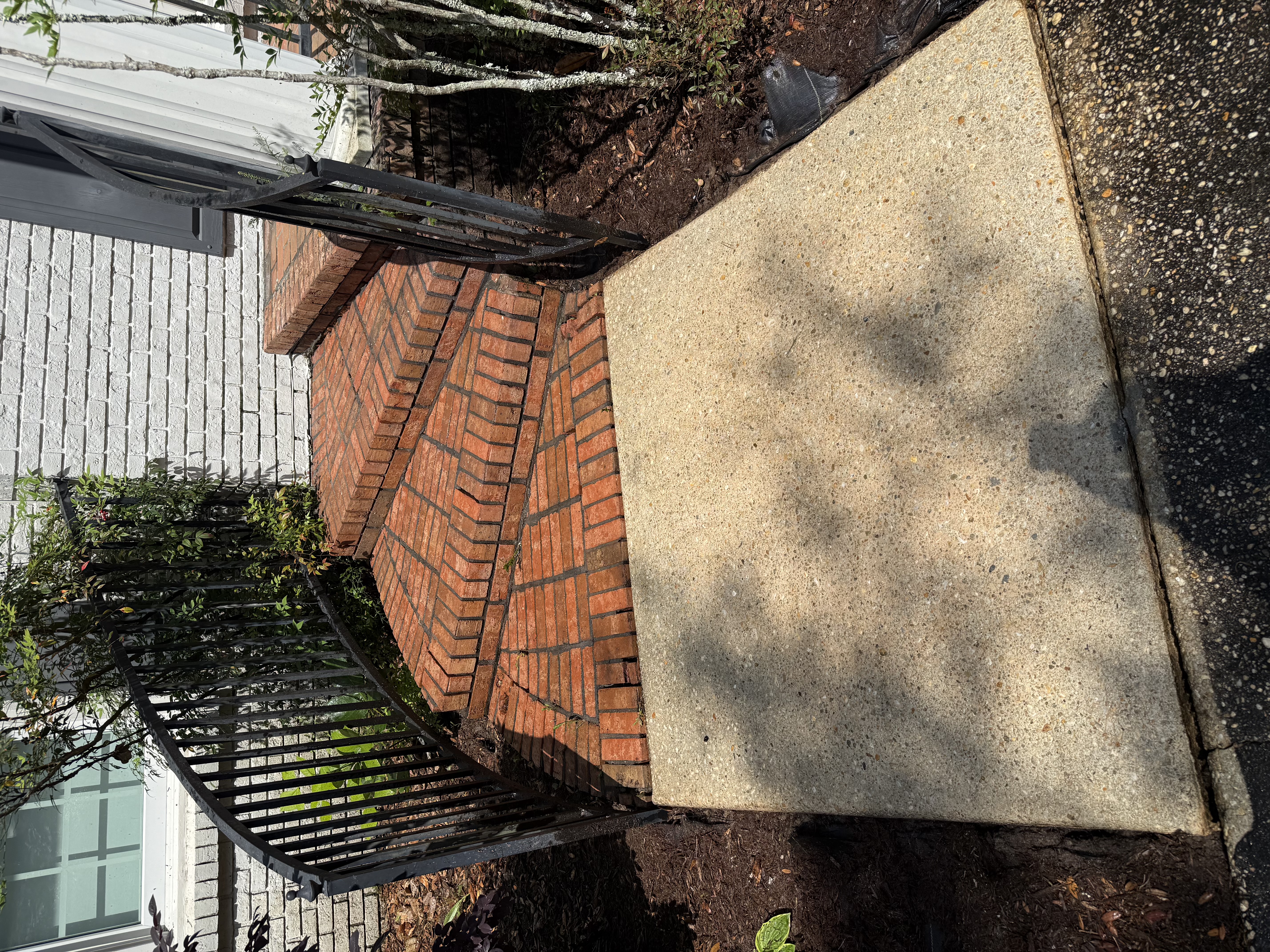 After pressure washing of cleaned outdoor stairs in Pensacola