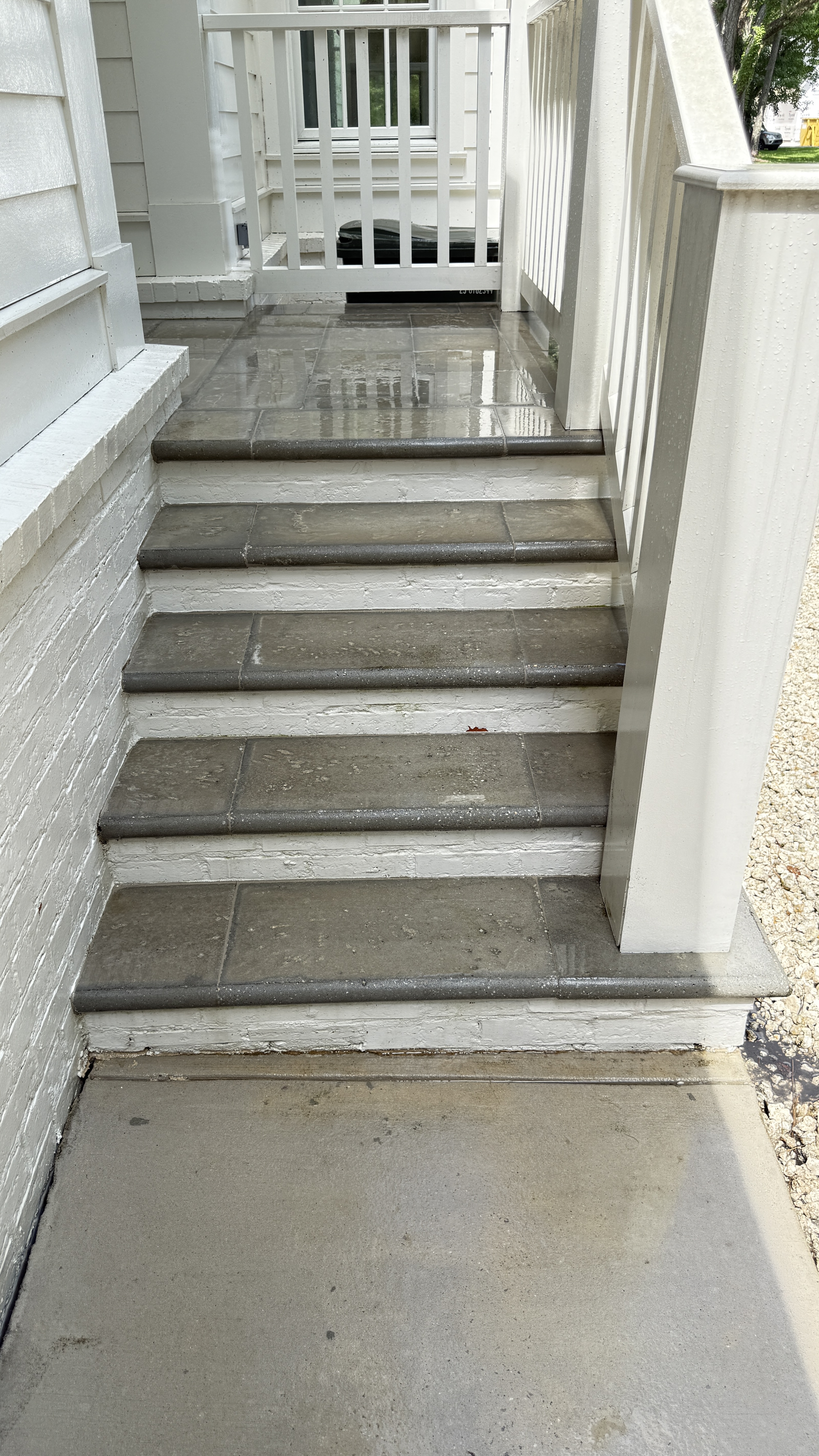 After pressure washing of outdoor stairs with cleaner tile and concrete in Fairhope